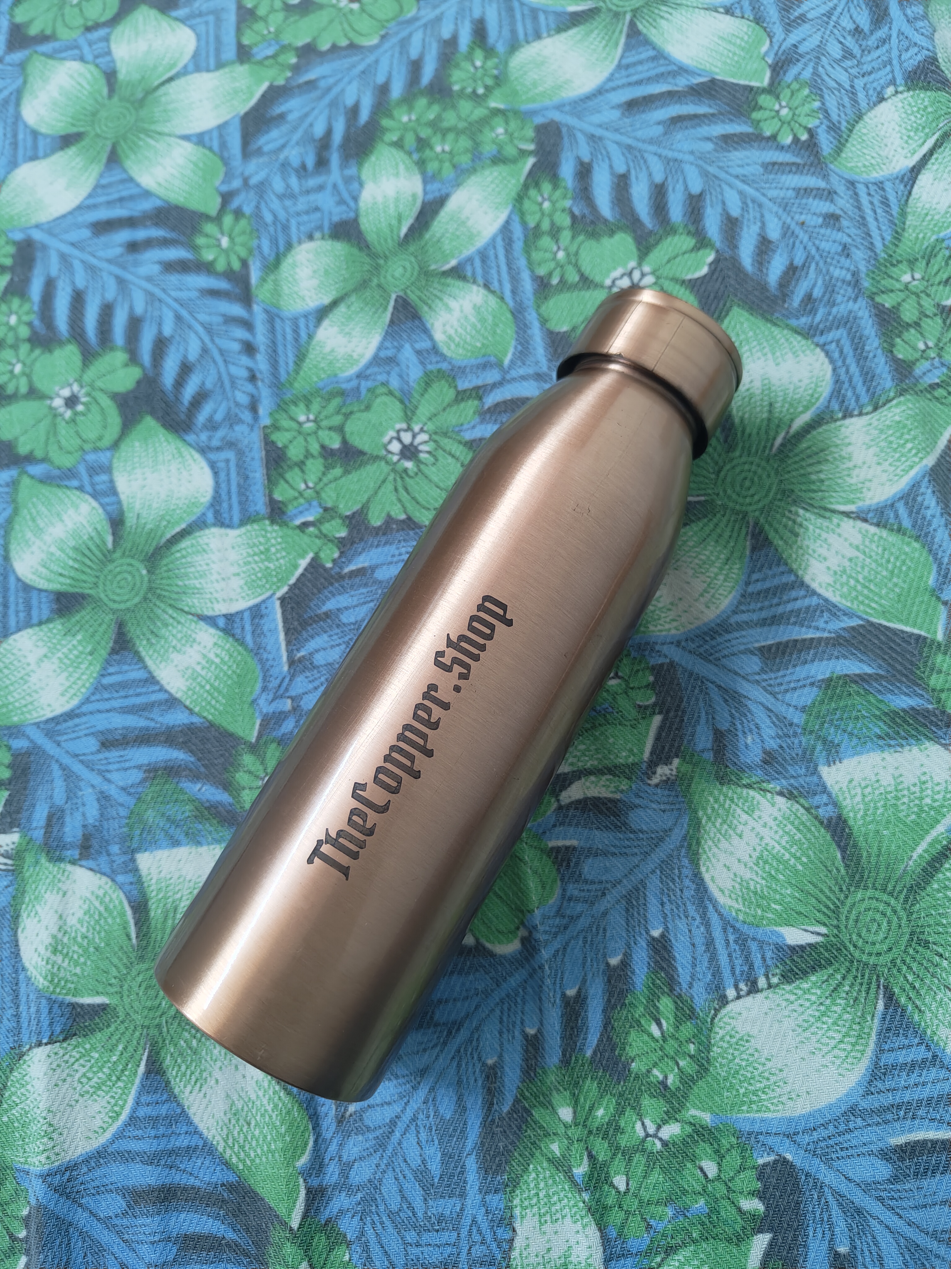 Copper bottle laid out